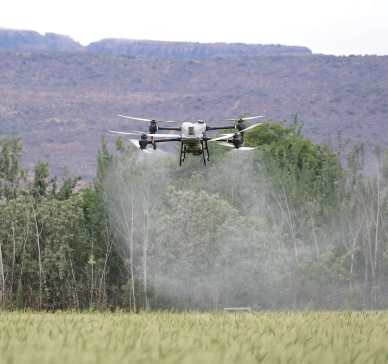 drone using agriculture spray nozzles