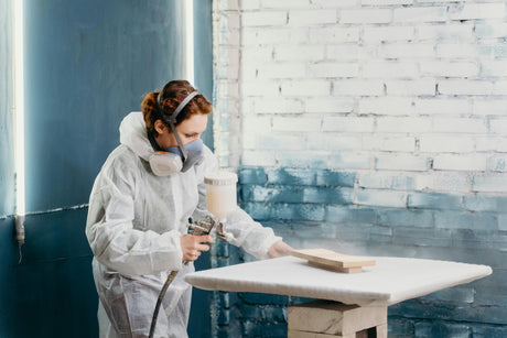 woman using pneumatic atomizing nozzle