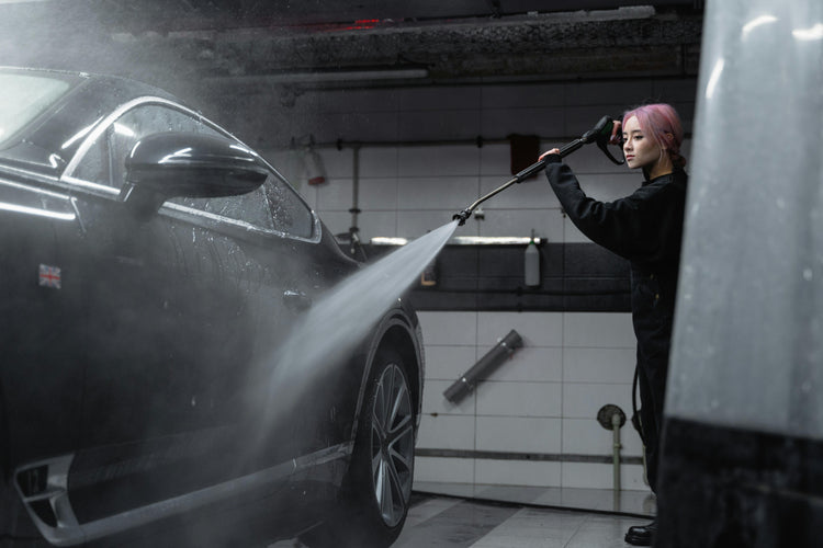 pressure washing a car
