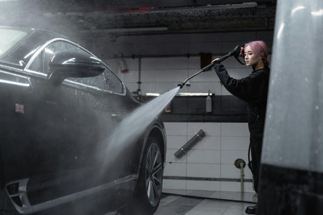 pressure washing a car